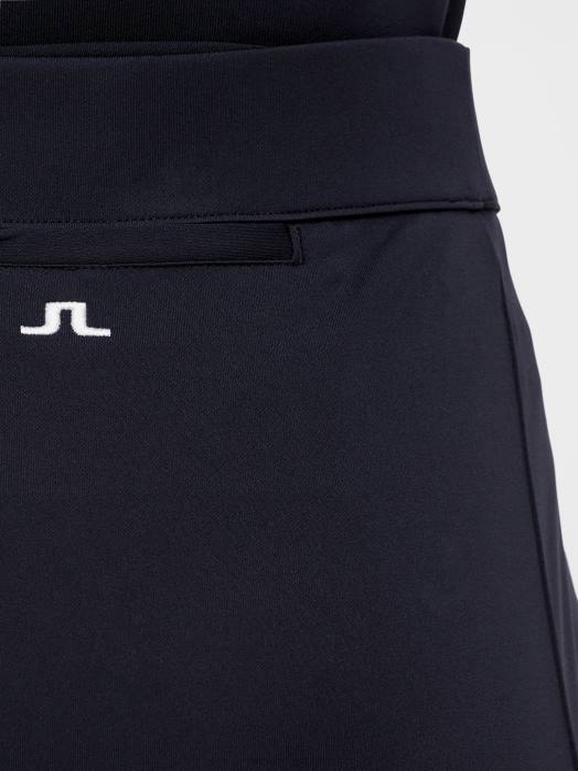 J.Lindeberg kvinner amelie mellomlangt skjørt marinen klær F8642746