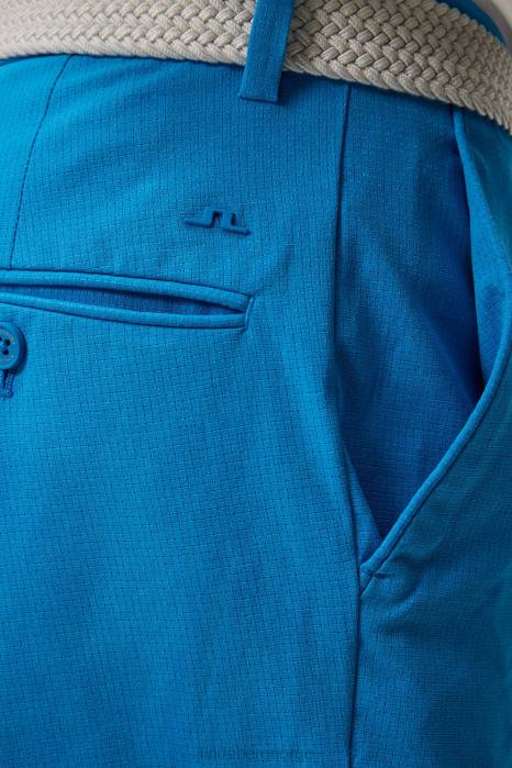 J.Lindeberg menn vent slim shorts strålende blå klær F864470