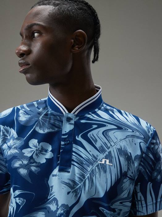 J.Lindeberg menn tyson print polo hibiskus blå klær F864339